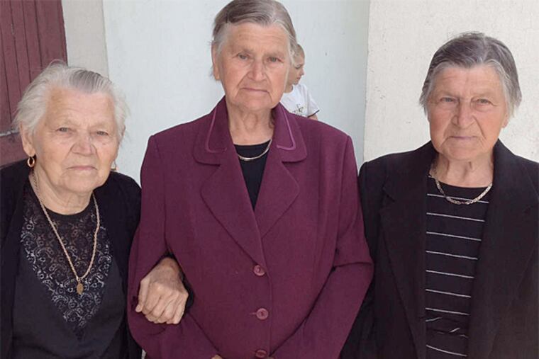 The three sisters (from left) Vera, Nadezhda, and Lubov, the author's cousins, outside the Church of the Holy Resurrection, in Jaczno, Poland.
