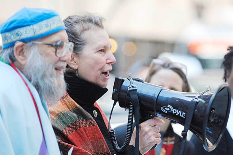 On April 10, 2014, communities of faith joined in prayerful protest as a “Protect Philadelphia” coalition opposed to the clear and present danger posed to Philadelphia neighborhoods rich and poor by mile-long oil trains carrying highly flammable North Dakota crude in unsafe tank cars, headed for local refineries. The protest was held outside the center city offices of Philadelphia Energy Solutions. (GABRIELA BARRANTES / STAFF PHOTOGRAPHER )