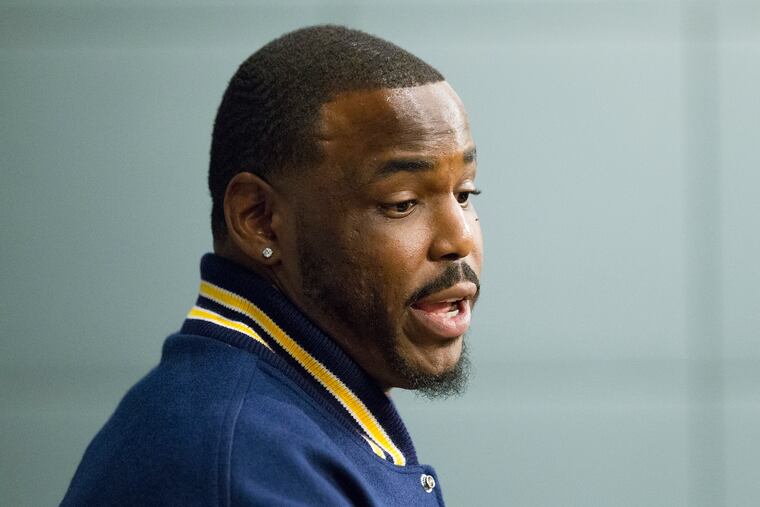 Malik Jackson answering questions at a press conference after being signed by the Eagles in March.