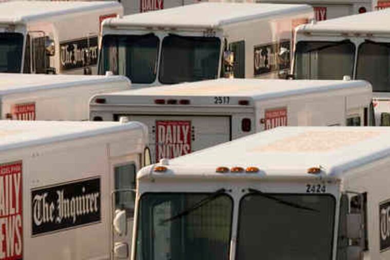 Philadelphia Newspapers' delivery trucks await papers at the Schuylkill Printing Plant. Higher costs for commodities such as fuel, ink and paper are among the problems besetting newspapers in the 21st century.