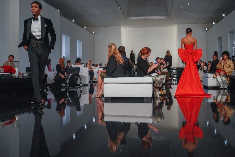 Fall-Winter 2022 fashion from Ralph Lauren is modeled, Tuesday March 22, 2022, in New York. A bill soon to be introduced in New York state aims to protect fashion models and influencers from exploitation. (AP Photo/Bebeto Matthews)