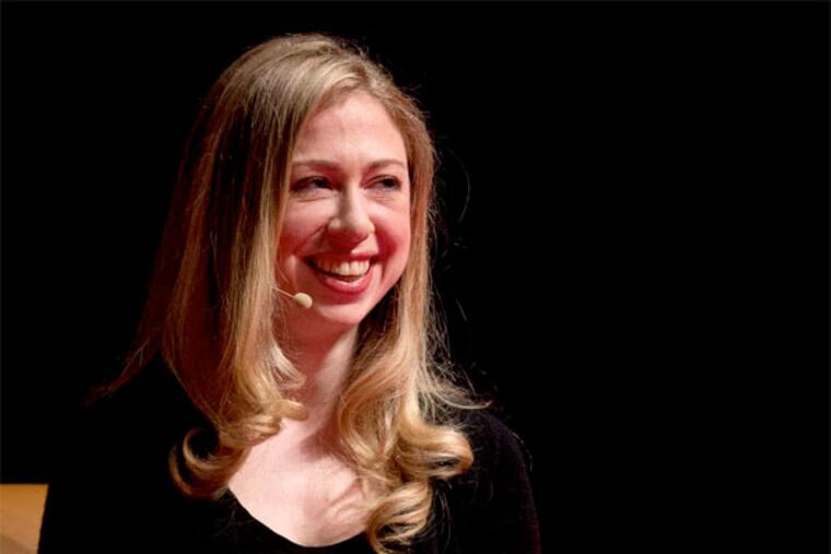 Former first daughter Chelsea Clinton will work on projects "related to health . . . around the world." (AP Photo / Mark Barker)