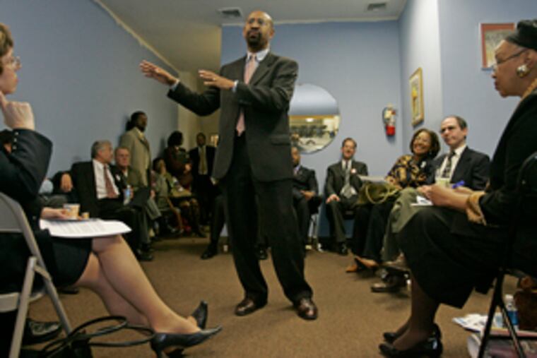 Michael Nutter campaigns at the African American United Fund Conference Center. His platformis drawing white voters in the city, while white millionaire Tom Knox appeals to the black vote.