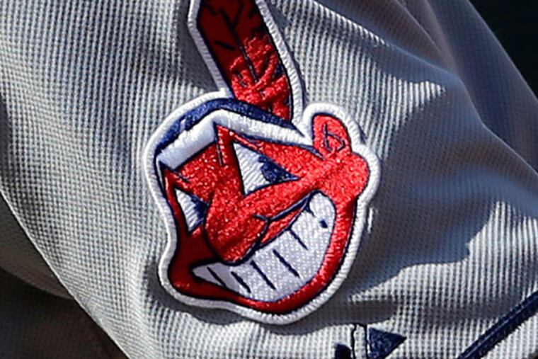 The Cleveland Indians logo is seen on Justin Sellers' jersey as he takes a lead from first base during a baseball game against the Baltimore Orioles, Sunday, May 25, 2014, in Baltimore. (Patrick Semansky/AP)