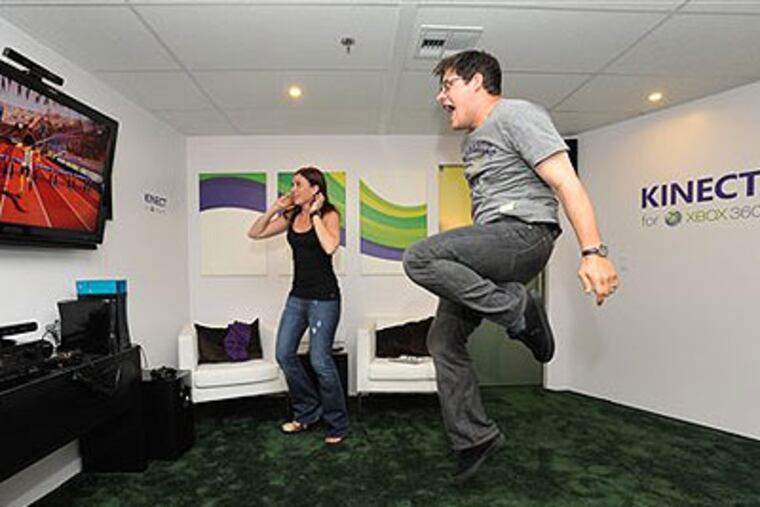 Actor Rich Sommer plays Kinect on Xbox 360 at the Xbox booth during the E3 2010 conference held at the Los Angeles Convention Center in Los Angeles on Tuesday. (Vince Bucci / AP Images for Xbox)