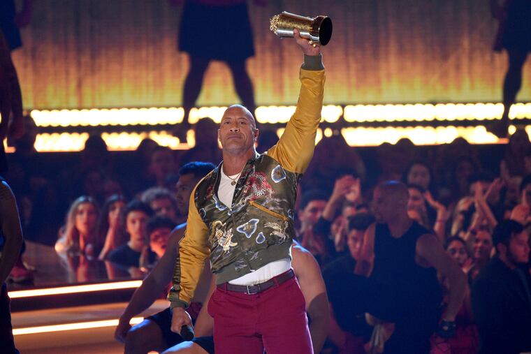 Dwayne "The Rock" Johnson accepts the generation award at the MTV Movie and TV Awards on Saturday, June 15, 2019, at the Barker Hangar in Santa Monica, Calif. (Photo by Chris Pizzello / Invision/AP)