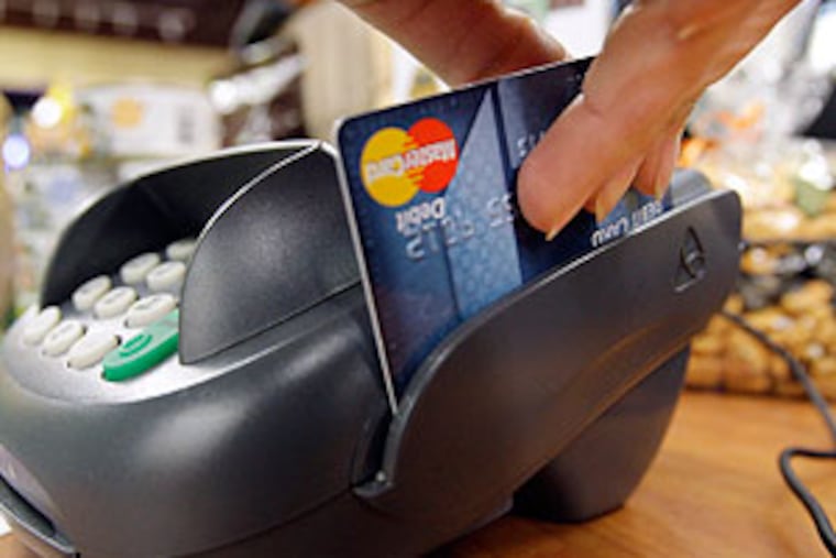 Bank of America is considering a pilot program of allowing customers to decide - while at a checkout counter - whether to pay an overdraft fee in exchange for being allowed to make a purchase when their card is declined because they are short on money.