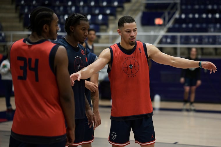 Jelani Williams, right, is in the NCAA Tournament with Howard after transferring from Penn. MUST CREDIT: Photo for The Washington Post by Craig Hudson