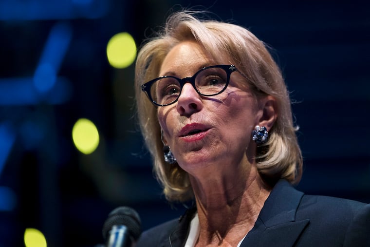 FILE - In this Sept. 17, 2018 file photo, Education Secretary Betsy DeVos speaks during a student town hall at National Constitution Center in Philadelphia. President Donald Trump’s school safety commission is proposing a rollback of Obama-era guidance that was meant to curb racial disparities in school discipline. The commission was led by DeVos and made dozens of policy recommendations in a report released Tuesday. Trump created the panel in March following the deadly school shooting in Parkland, Florida. (AP Photo/Matt Rourke)