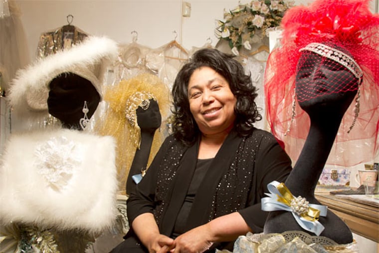 Vows Timeless Bridal Millinery owner, Patrica A. Grooms, is retiring after decades in the business. Grooms, who is in her 70s, has a long history of making church-goers and brides pretty in Philadelphia. She is shown among some of her creations. (Charles Fox/Staff Photographer)