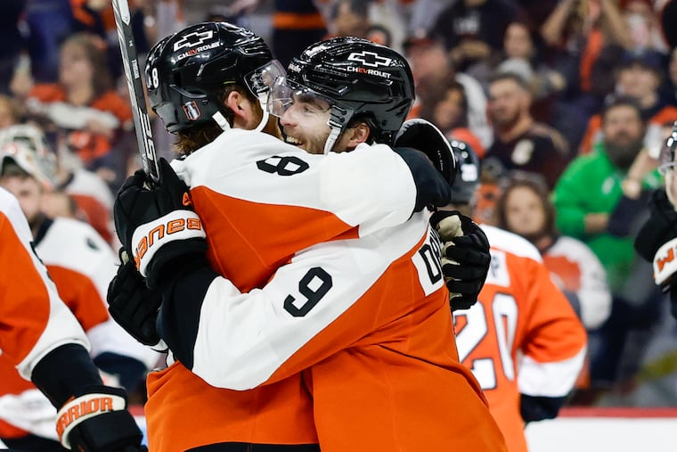 Flyers defenseman Cam York celebrates his game-winning goal with Flyers defenseman Jamie Drysdale during overtime to clinch the series in Game 6.