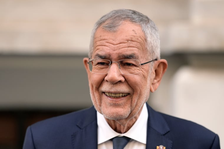 Austrian President Alexander Van der Bellen looks on after casting his vote for the Austrian Presidential election in Vienna, Austria, Sunday, Oct. 9, 2022. Austria's liberal president is hoping to be re-elected on Sunday without the need for a runoff vote.