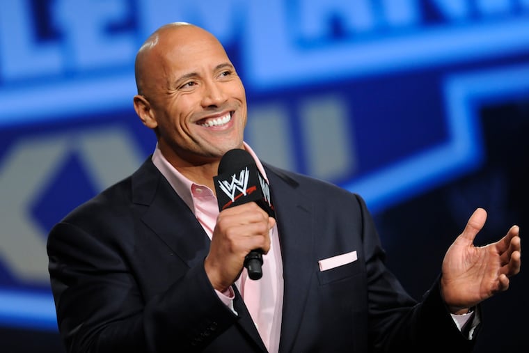 Actor and former WWE Superstar Dwayne "The Rock" Johnson participates in a Wrestlemania XXVII press conference at the Hard Rock Cafe in Times Square in 2011 in New York.
