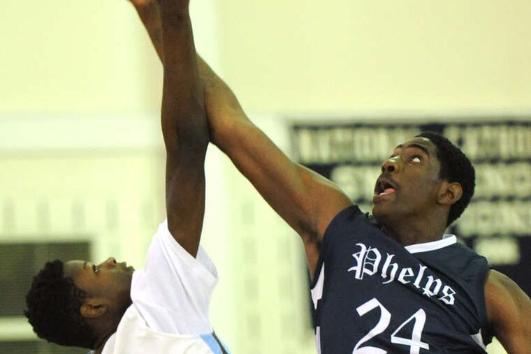 Westtown junior Mohamed Bamba (left) battles Phelps' Mike Watkins for a rebound in a February game. Bamba has a 7-foot-8 wingspan.