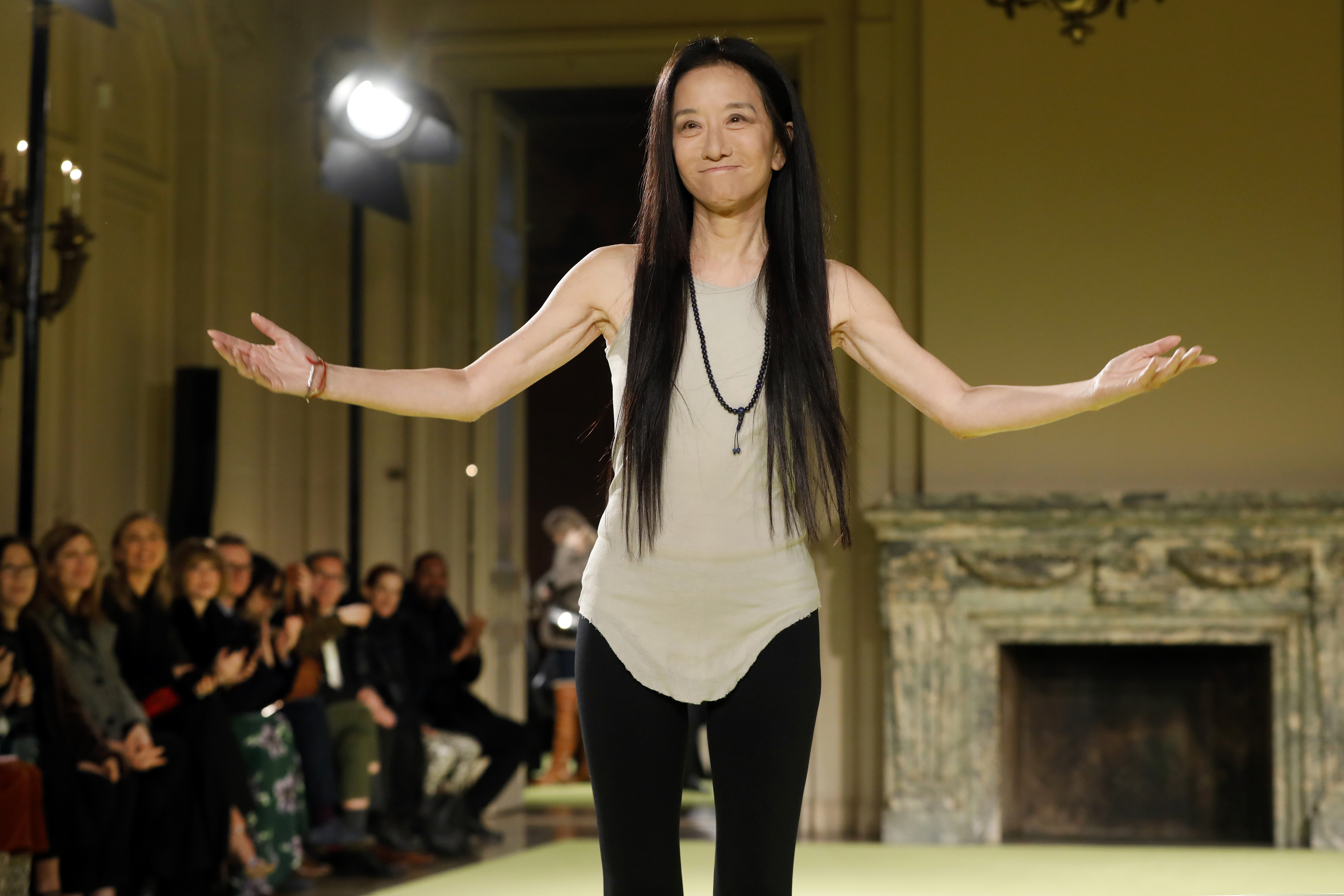 Designer Vera Wang walks down the runway at a New York Fashion Week show in 2020. Wang was the first major designer to work on NFL cheerleader uniforms when she revamped the Eagles' in 2003.