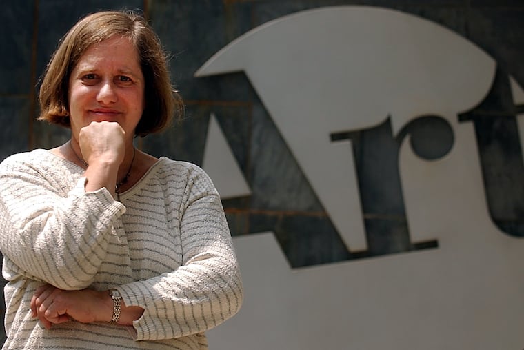 Ms. Herman stands in front of the Main Line Art Center in 2003.