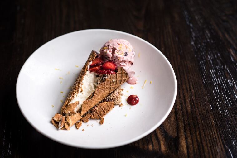 At Vernick Food and Drink, strawberry stracciatella ice cream tops a waffle cone that's spiced with coriander and glazed with dark chocolate. Inside the cone awaits macerated fresh strawberries and a fluffy vanilla-rooibos mousse.
