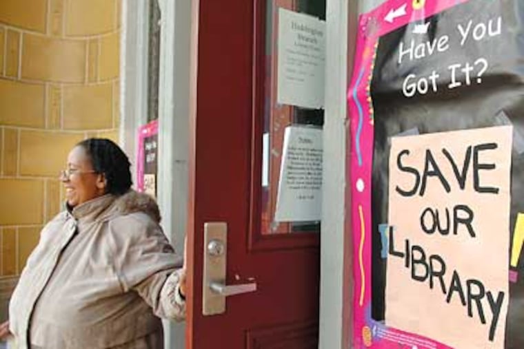 Bernadene Davis leaves the Philadelphia Free Library Haddington Branch. Amy Dougherty, director of Friends of the Free Library Philadelphia, asked the mayor to delay plans to close branches. (Sharon Gekoski-Kimmel / Staff Photographer)