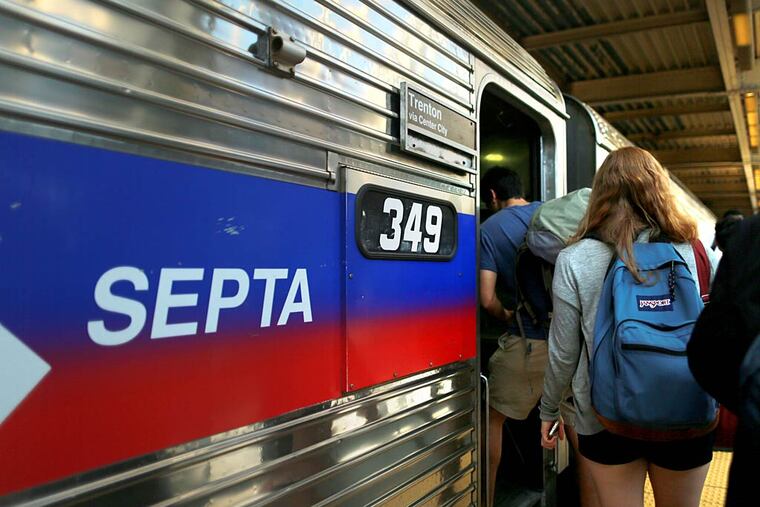 A SEPTA Trenton Line train pulls onto track four at 30th Street Station. A panel appointed by President Obama sided with SEPTA management Monday on most of the issues in its long-running labor dispute with Regional Rail engineers and electrical workers.