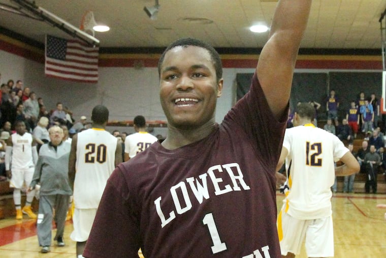 JaQuan Johnson reacts to Lower Merion’s upset of Roman Catholic.