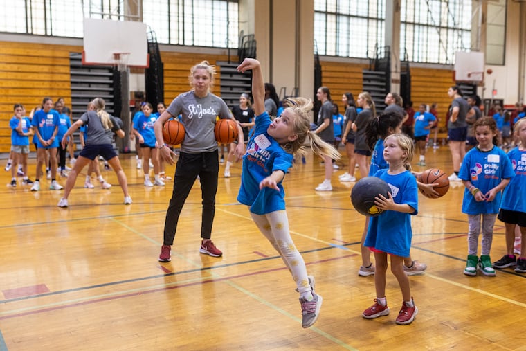 Girls from all over the Philadelphia area go through basketball drills with the various women college teams during the Philly Girls Got Game youth clinic held at South Philadelphia High School on Sept. 30.