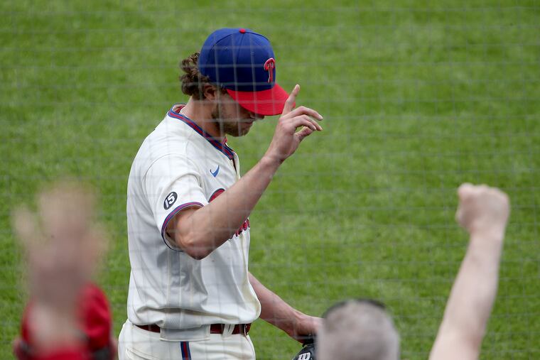 Phillies ace Aaron Nola acknowledges the crowd at Citizens Bank Park after pitching a two-hit shutout against the St. Louis Cardinals.