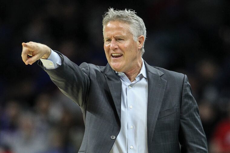 Sixers coach Brett Brown calls plays against the Pistons during the team's last game before the NBA season was suspended.