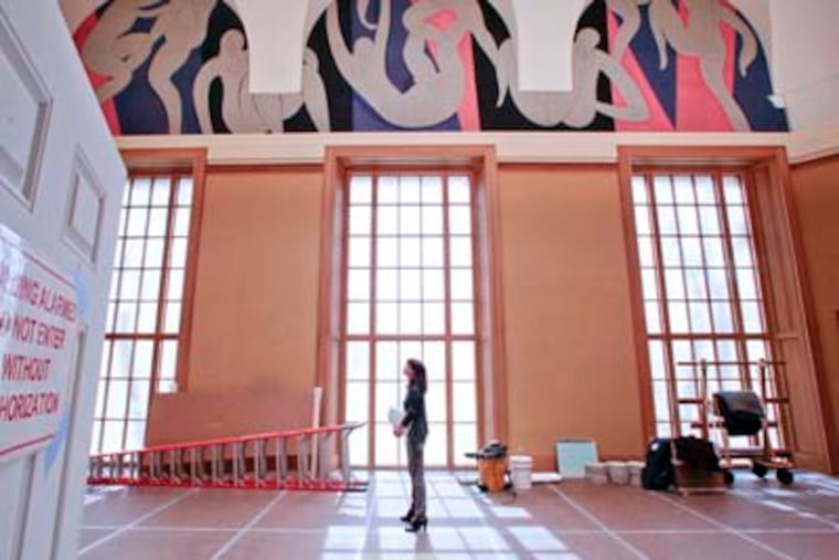 Nancy S. Leeman, senior registrar, examines "The Dance," a three-panel mural by Henri Matisse now at The Barnes Philadelphia. The panels were moved from The Barnes Merion. Leeman is in charge of moving the collection to Philadelphia. MICHAEL S. WIRTZ / Staff Photographer
