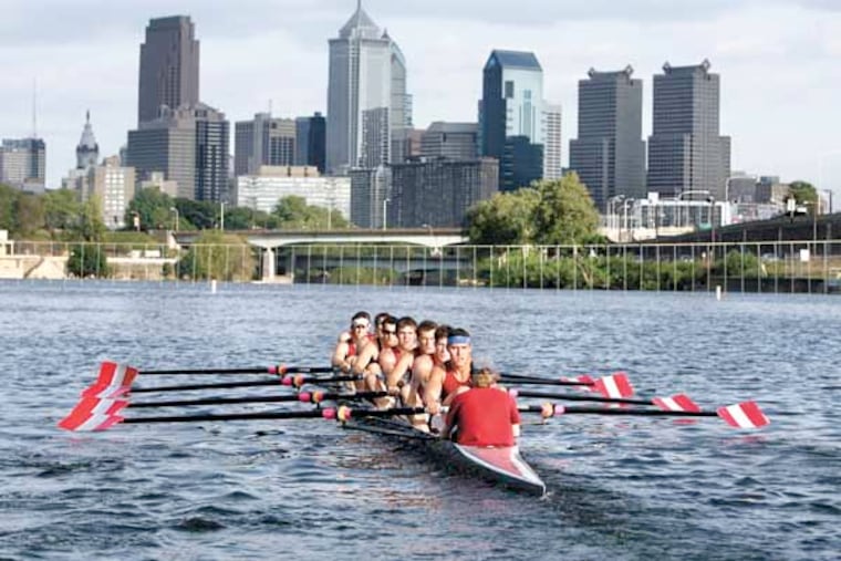 The varsity eight crew from Saint Joseph's University works out on the Schuylkill River Wednesday evening in preparation for the Dad Vail Regatta this weekend. DADVAIL11d (Barbara L. Johnston/Inquirer)