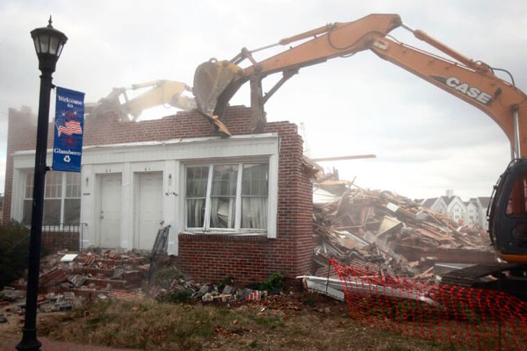 Glassboro will demolish a building at 21 High Street to make room for a new town square, scheduled to open in 2014. The town square will link new retail and development on Rowan Blvd. to existing retail on Main and High Streets as part of a larger redevelopment effort in Glassboro. ( DAVID SWANSON / Staff Photographer )