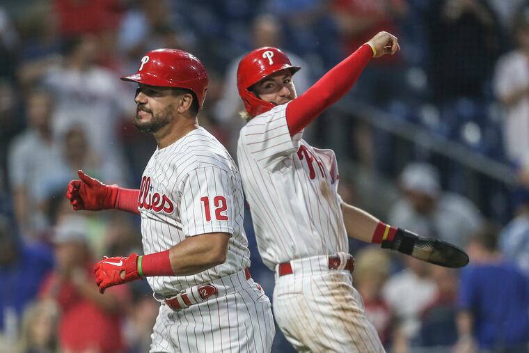 The Phillies' Kyle Schwarber, left, celebrates his two-run home run against the Giants with teammate Bryson Stott during the sixth inning Wednesday.