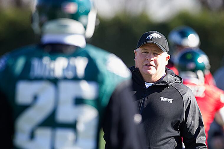 Eagles head coach Chip Kelly and running back LeSean McCoy. (Ed Hille/Staff Photographer)