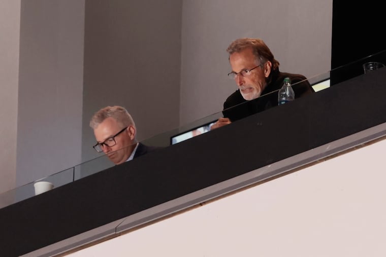 Flyers coach John Tortorella (right) watches play from the coaches' box during the exhibition game against the Capitals on Friday.