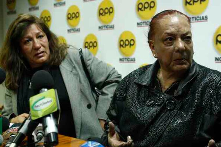 Angelica Ocampo and Elvira Pelaez , the sister and motherof Vicky Pelaez, a Spanish-language journalist born in Peru. Pelaez was granted bail but won't be freed before Tuesday.