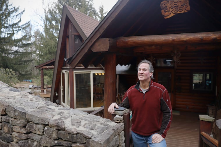 “It takes a different kind of person to want a mini lodge,” says Doug Guyer, who lives in Phoenixville on a property he and his wife, Toop, have tailored to their family's liking over 30 years.