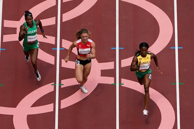 Jamaica's Shelly-Ann Fraser-Pryce, right, hopes to become the first woman to win three Olympic 100-meter sprint gold medals.