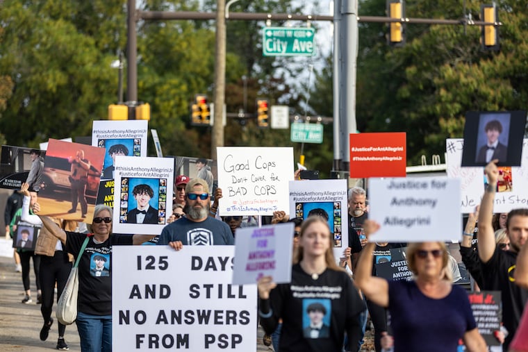 Family, friends, and supporters march towards the Pennsylvania State Police headquarters on Belmont Rd. in Philadelphia on Oct. 7, 2023, to protest for transparency in the investigation into the police shooting of Anthony Allegrini Jr. that occurred in June 2023.
