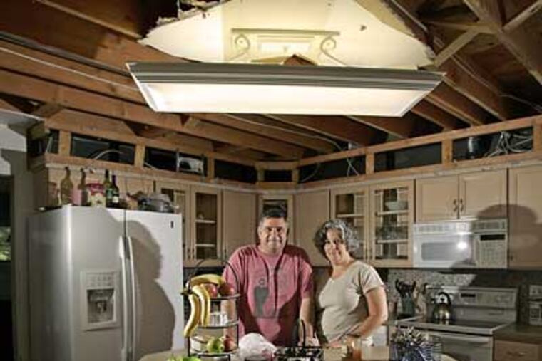 In the middle of remodeling the kitchen of their Mullica Hill house, Paul Gablin and his wife Julianne received a letter from Wachovia Bank canceling their line of credit. (Michael Perez / Inquirer)