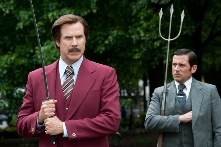 This image released by Paramount Pictures shows Will Ferrell as Ron Burgundy, left, and Steve Carell as Brick Tamland in a scene from "Anchorman 2: The Legend Continues." (AP Photo/Paramount Pictures, Gemma LaMana)