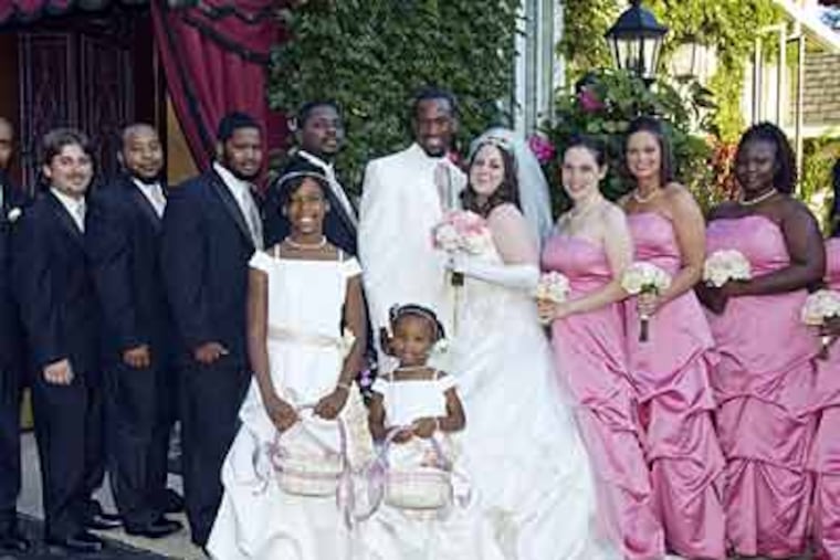 Ashley Hayman and Shumpert Caldwell with their wedding party. (Flash Rosenberg)