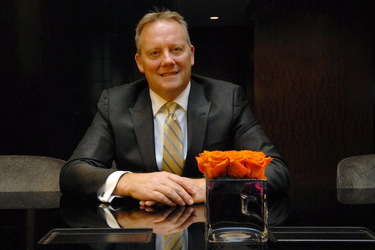 Ed Grose, seated in the lobby of Loews Philadelphia Hotel, is the executive director of the Greater Philadelphia Hotel Association. Area hotels will be filled this weekend because of the Army-Navy football game.