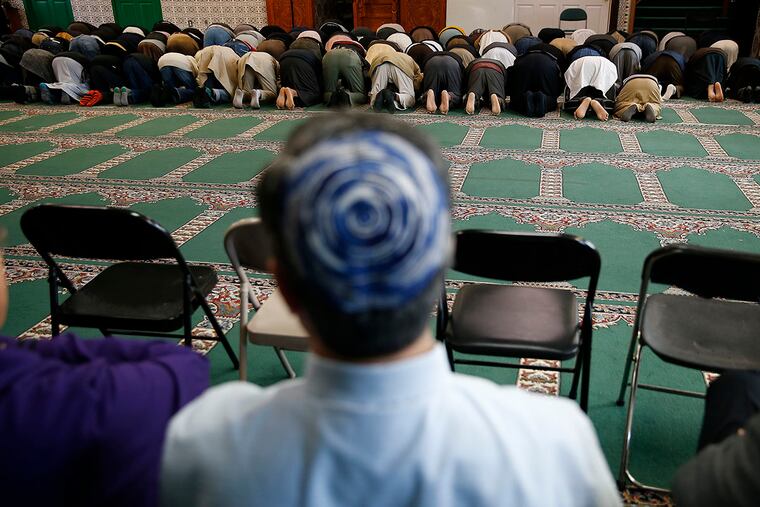 Congregants from Old York Rd. Temple Beth Am in Jenkintown visit the North Penn Mosque in Lansdale to learn about the Muslim religion, observe a prayer session and share a traditional meal on January 8, 2017.