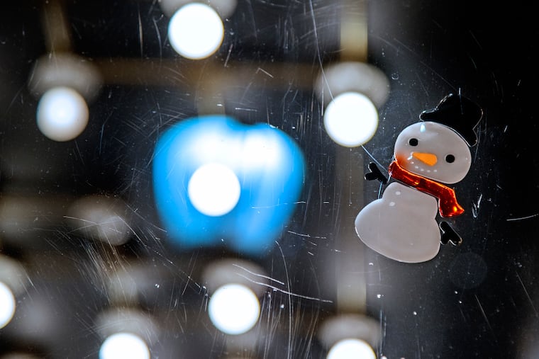 Not quite the "high-water mark of the pre-Christmas season" department store window display that Ralphie pressed his face against in the classic movie, "A Christmas Story," but Center City retailers still entice shoppers with their visual merchandising. This is along Walnut Street.