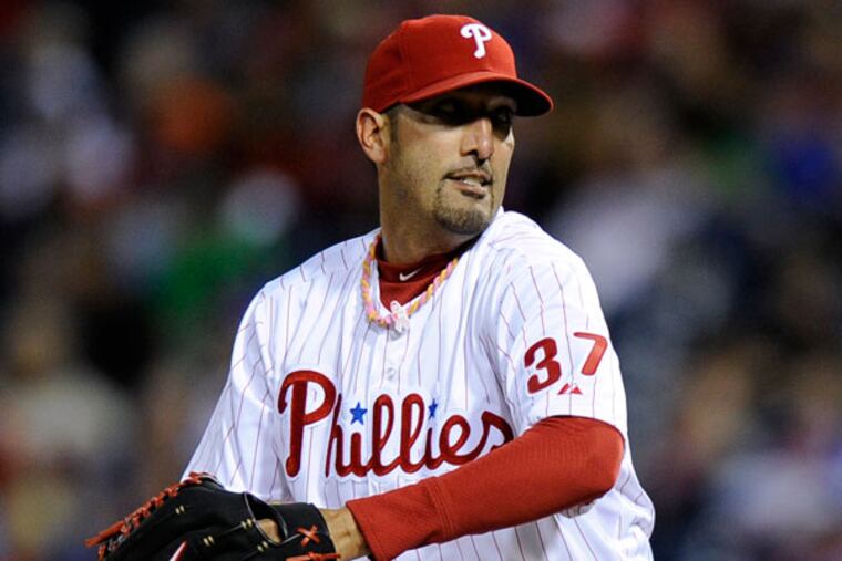 Mike Adams is shown during a baseball game against the Miami Marlins on Friday, May 3, 2013, in Philadelphia. (Michael Perez/AP file)
