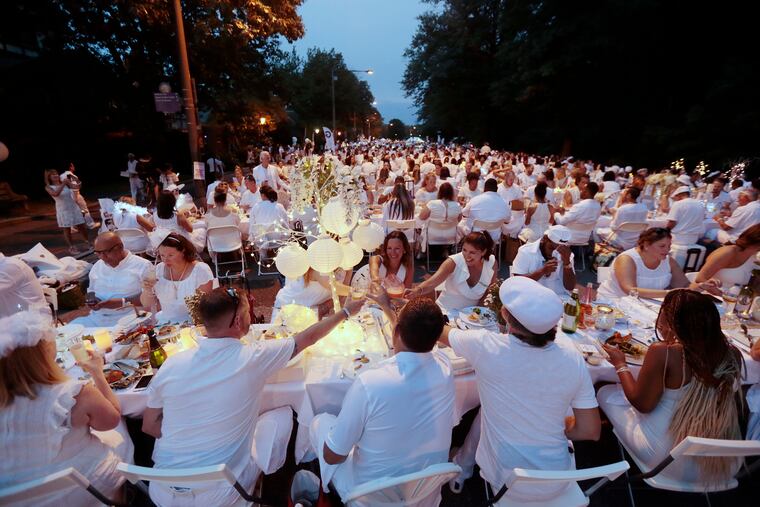 Guests party on Kelly Drive during Le Dîner en Blanc Philadelphia 2019 on August 22, 2019.