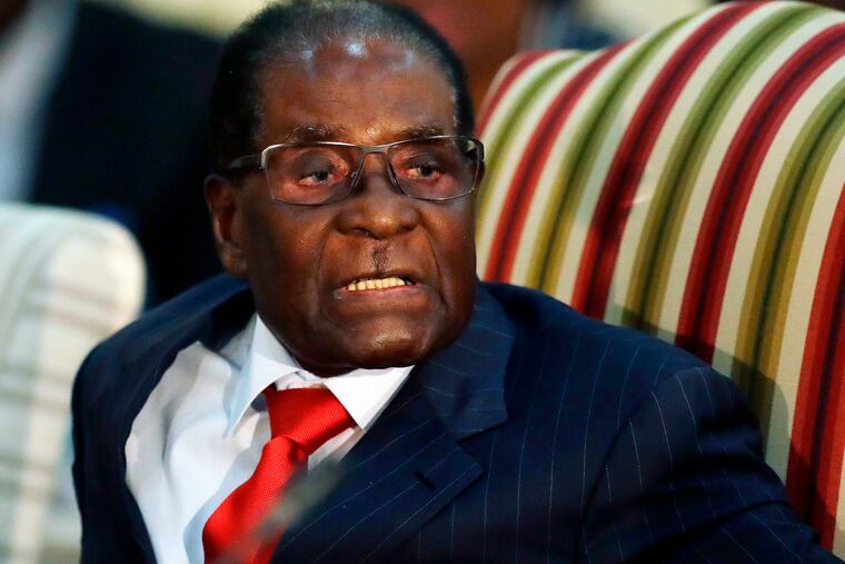 Zimbabwean President Robert Mugabe introduces his cabinet minister during a meeting with South African President Jacob Zuma at the Presidential Guesthouse in Pretoria, South Africa, in 2017.