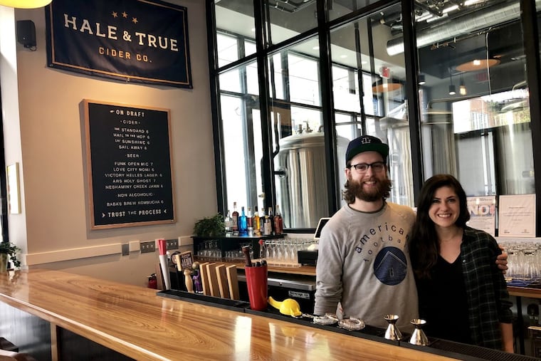 Owners Kerry and Risa McKenzie behind the bar at Hale & True, 613 S. Seventh St.