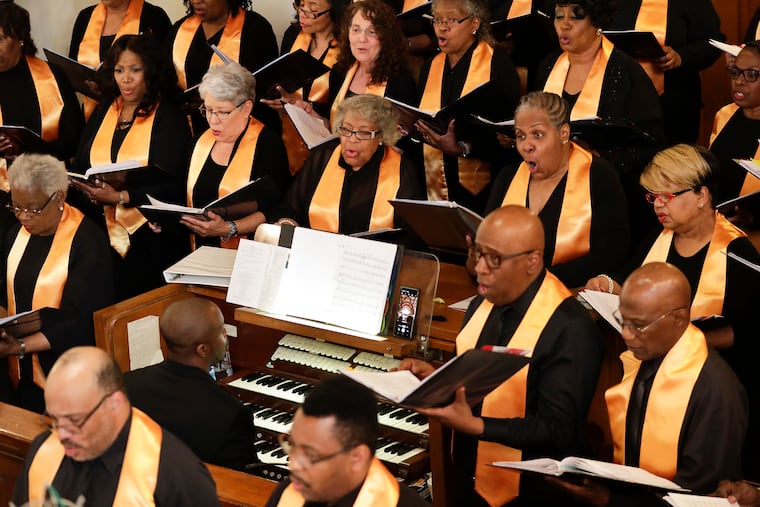 Members of the choir perform the Philadephia Community Mass Saturday at Mother Bethel A.M.E. Church in Society Hill.