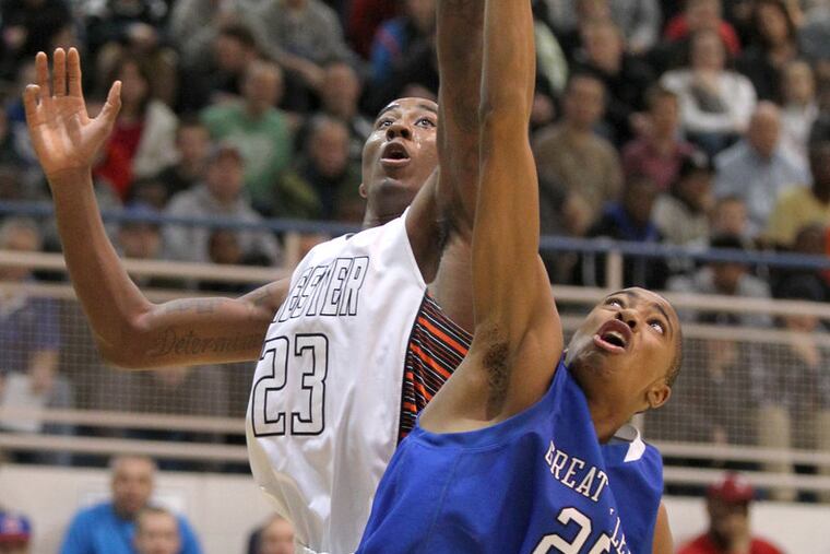 Rondae Jefferson, left, of Chester, and Mikal Bridges of Great Valley go after a rebound in the first quarter of the PIAA Class AAAA State Boys Basketball Quarterfinals held at Spring-Ford High School in Royersford. ( CHARLES FOX / Staff Photographer )