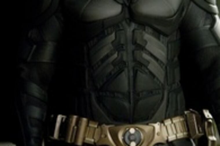 Christian Bale stars as Batman in "The Dark Knight," in which the superhero is tested by the menacingly mad Joker - Heath Ledger in an Oscar-worthy performance.